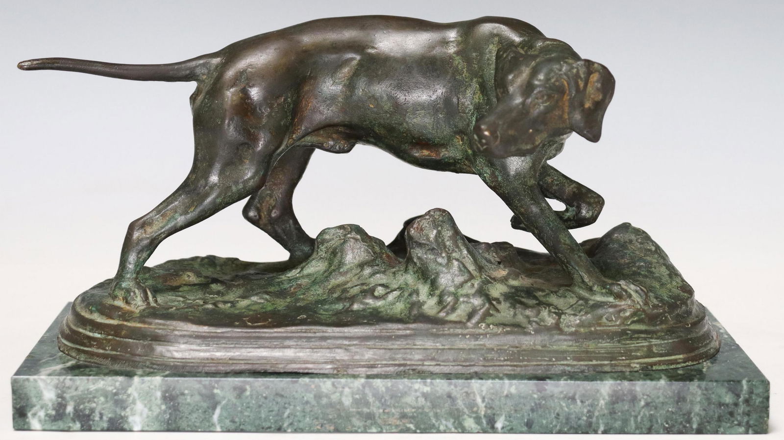 PATINATED BRONZE SCULPTURE OF A POINTING DOG (1 of 3)