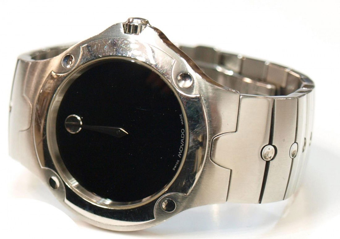 MEN'S MOVADO 'LUNO' SPORTS EDITION WRIST WATCH: Men's Movado 'Luno Sport' stainless steel bracelet and case having a black dial, light wear/scratches with age, operating at this time, 120 grams total