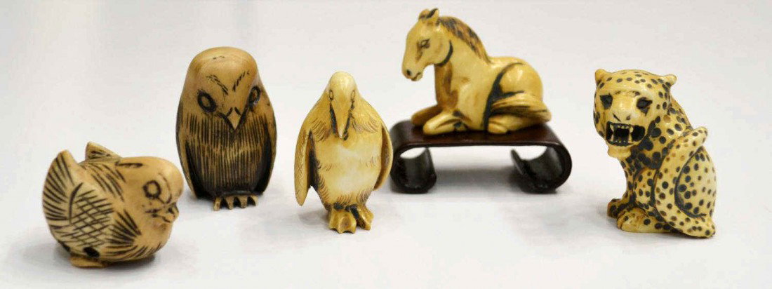 (5) CARVED IVORY & OTHER ANIMAL FORM NETSUKES: **This lot will not be shipped Internationally** (lot of 5) Ivory and composite like netsukes, all signed on bottom, comprising: (1) ivory seated horse on wooden stand, 1.25"h, 1.75"w; (1) ivory bird 