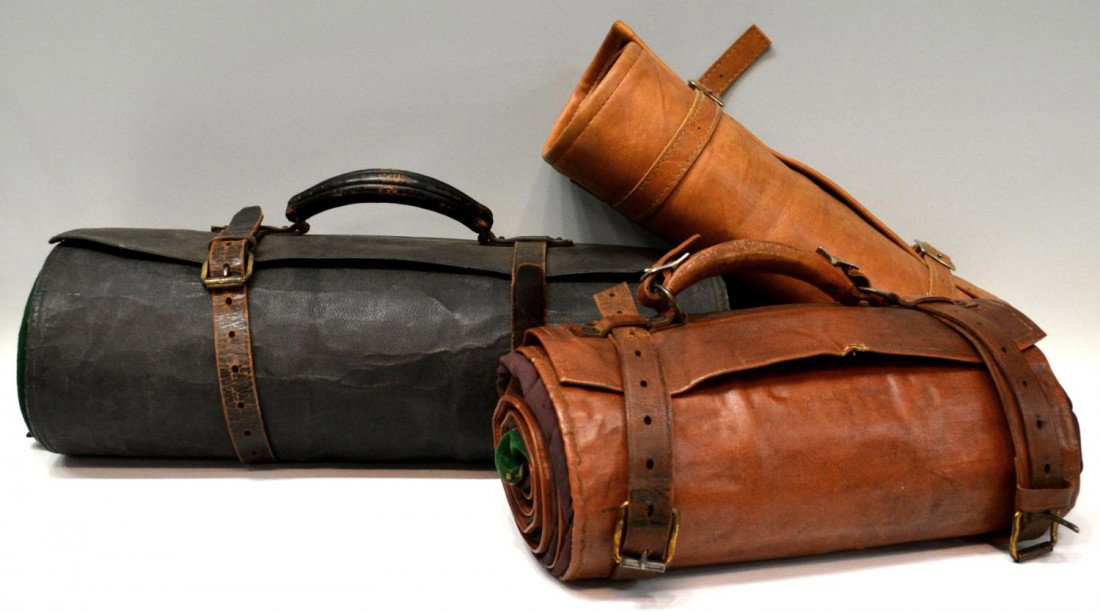 VINTAGE KNIVE COLLECTORS STORAGE ROLLS, W.R. CASE: (lot of 3) Vintage salesman's or collectors knife rolls: (1) W.R. Case & Son Cutlery Company, Bradford, Pa., space for 150 knives, opens to 76", rolled empty: 14"w, 6.5"d; (1) National Knife Collector