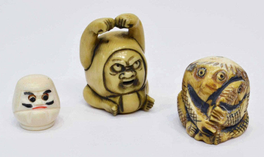 (3) JAPANESE FIGURAL CARVED IVORY NETSUKES: **This lot will not be shipped Internationally** (lot of 3) Japanese carved ivory netsukes, comprising: (1) depicting a long nosed figure with a turtle shell on back holding a fish, characters on base