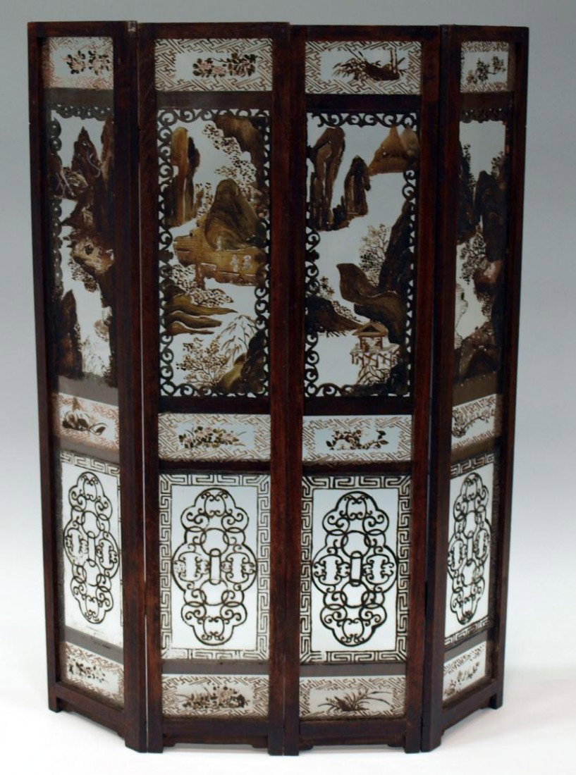 CHINESE REVERSE PAINTED GLASS FOUR-PANEL SCREEN: Chinese four-panel table screen, 19th/20th c., wood frame and reticulated borders set with reverse painted glass panels, landscape and foliated scenes, joined by wood dowels, some paint loss, loss of 