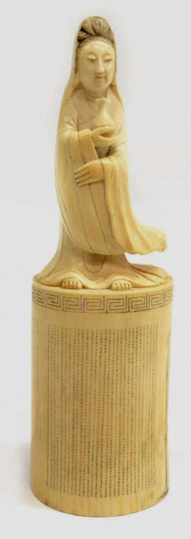 CHINESE IMPERIAL STYLE FIGURAL CARVED IVORY SEAL: **This item will not be shipped Internationally**Large Chinese ‘imperial-style’ ivory seal, 20th c., of cylindrical shape surmounted by a figure of Guanyin standing with an amphora above an incise