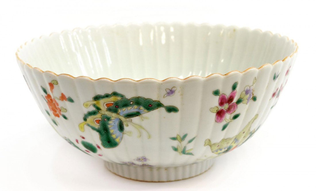 CHINESE PORCELAIN BUTTERFLY DECORATED BOWL: Chinese polychrome enamel decorated porcelain bowl, 20th c., the interior well painted in bright enamels with a butterfly and flowering sprays, the fluted exterior sides with further butterflies amid 