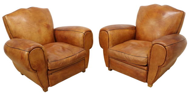 (2) FRENCH ART DECO TAN LEATHER CLUB CHAIRS: (pair) French Art Deco tan leather club chairs, c.1930s, having shell-shaped back, over rolled arms, removable seat cushion, rising on squared supports, patination, creasing, spotting, and wear to