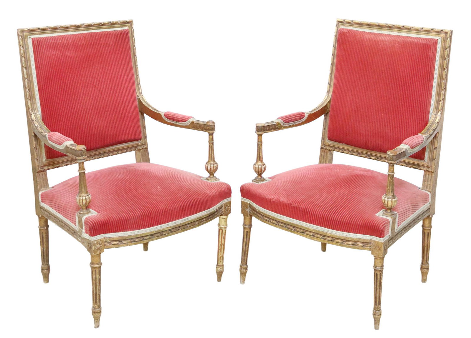 (2) FRENCH LOUIS XVI STYLE GILT FAUTEUILS: (pair) French Louis XVI style gilt armchairs, late 19th c., having ribbon trim, in a red upholstery, fluted and tapered legs, ending in blunt arrow feet, approx 37.5"h, 23.75"w, 24"d, seat height: app