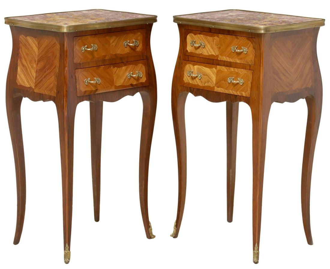 (2) FRENCH LOUIS XV STYLE MARBLE-TOP NIGHTSTANDS: (pair) French Louis XV style nightstands, early 20th c., having shaped marble top with gilt metal trim, over matched veneer case fitted with two drawers, rising on cabriole legs, ending on sabots, app
