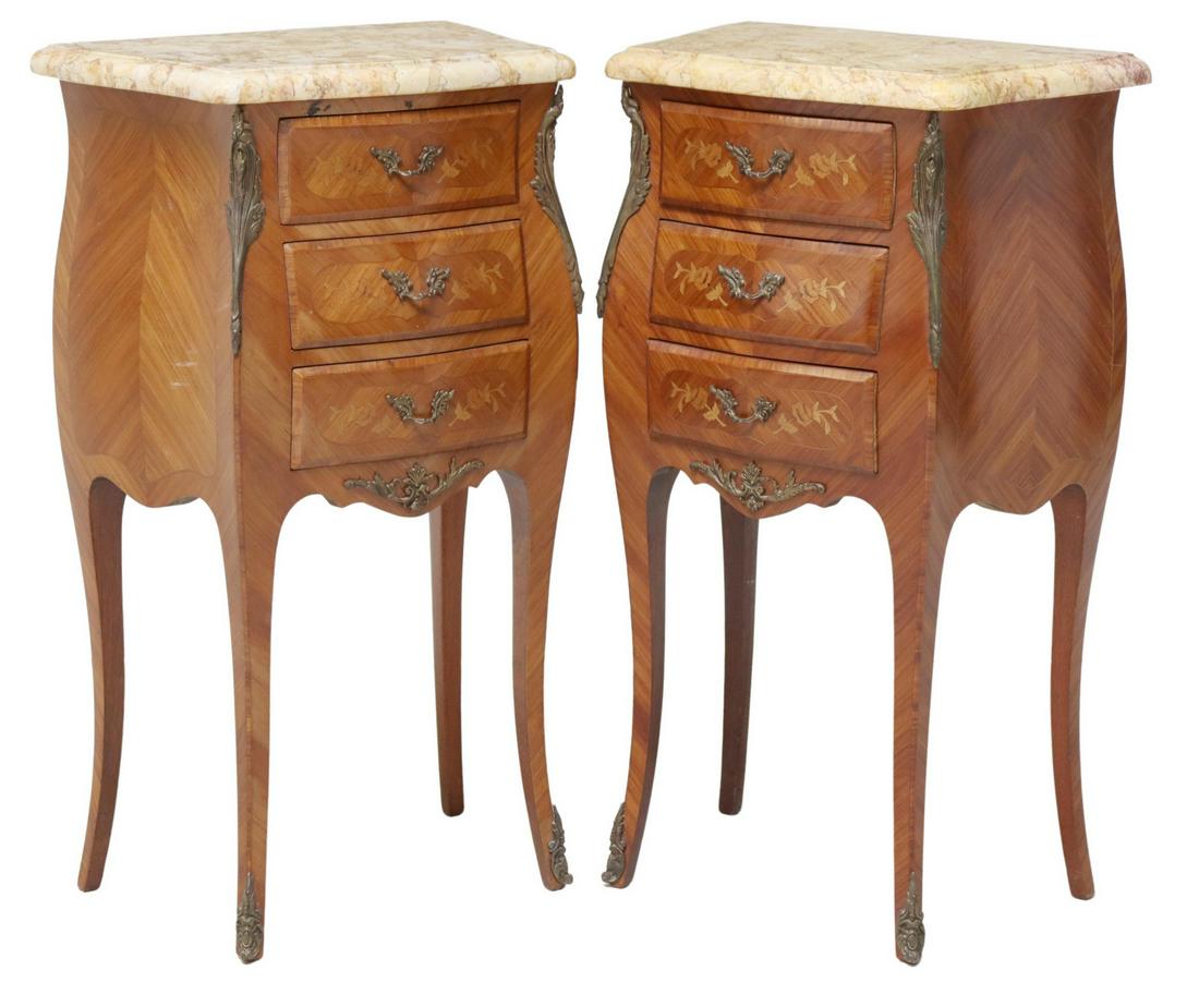 (2) FRENCH LOUIS XV STYLE MARQUETRY NIGHTSTANDS: (pair) French Louis XV style mahogany nightstands, 20th c., having shaped marble top, over three drawers, with floral marquetry, rising on cabriole legs, ending in sabots, approx 29 1/8"h, 16.5"w, 10.