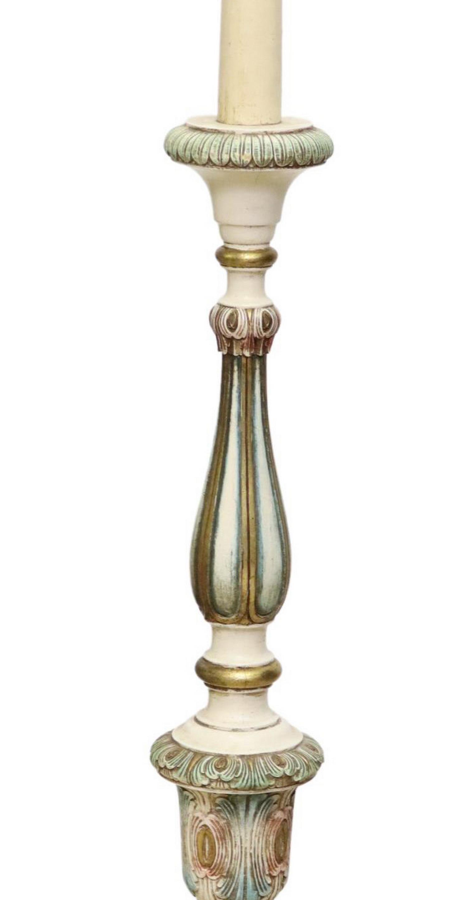 CARVED & PAINTED ALTAR PRICKET STANDING FLOOR LAMP: Polychrome painted wood altar pricket floor lamp, early 20th c., having single light, over turned standard with carved foliate motifs, rising on scrolled tripartite base, in need of wiring, approx 63"