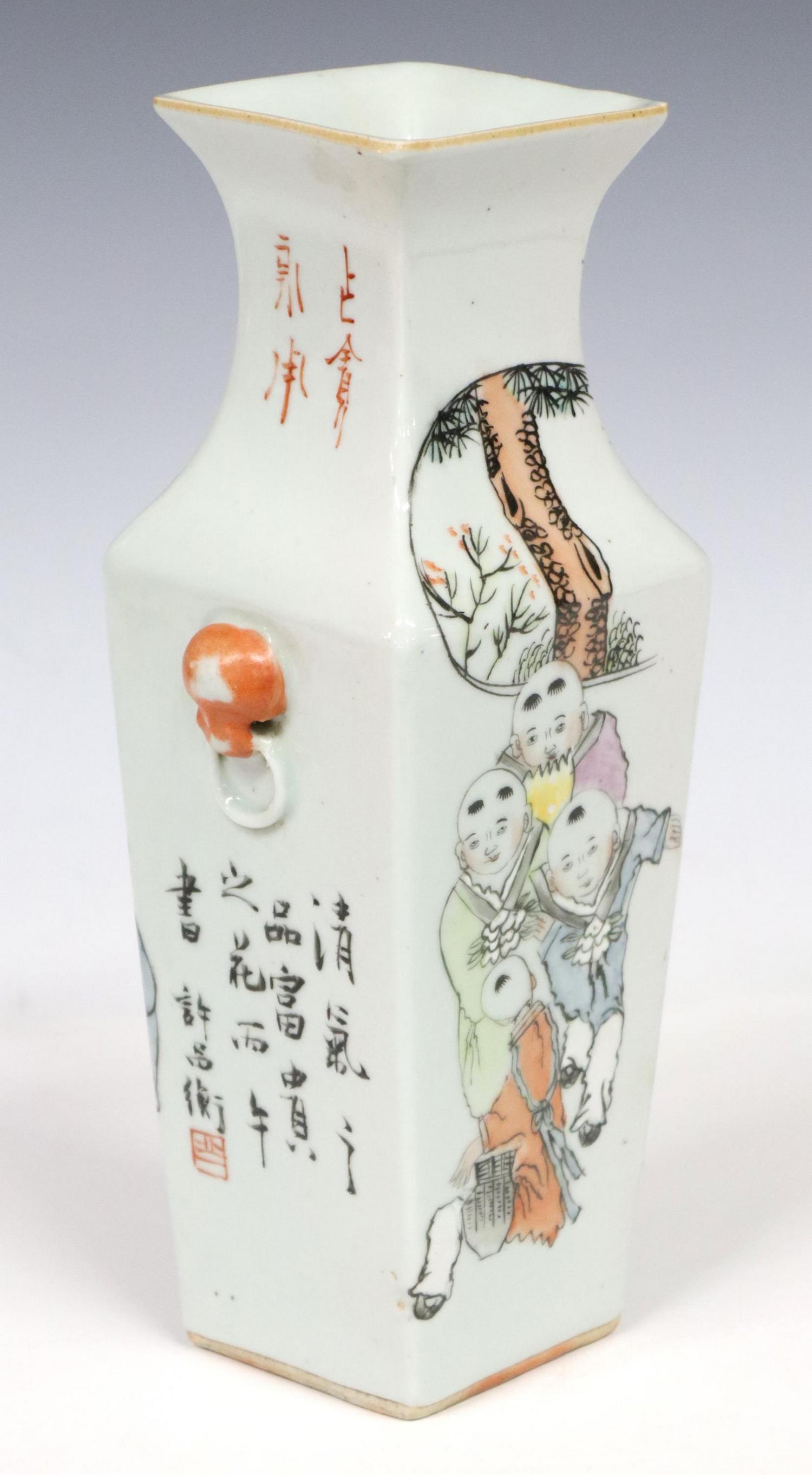 CHINESE FAMILLE ROSE FIGURAL PORCELAIN VASE: Chinese famille rose porcelain vase, having squared rim, over tapered body, with foo lion handles, in alternating figural scenes and characters, approx 10"h, 4.25"w (handles), 3.5"d, 2.25lbs Start Pri