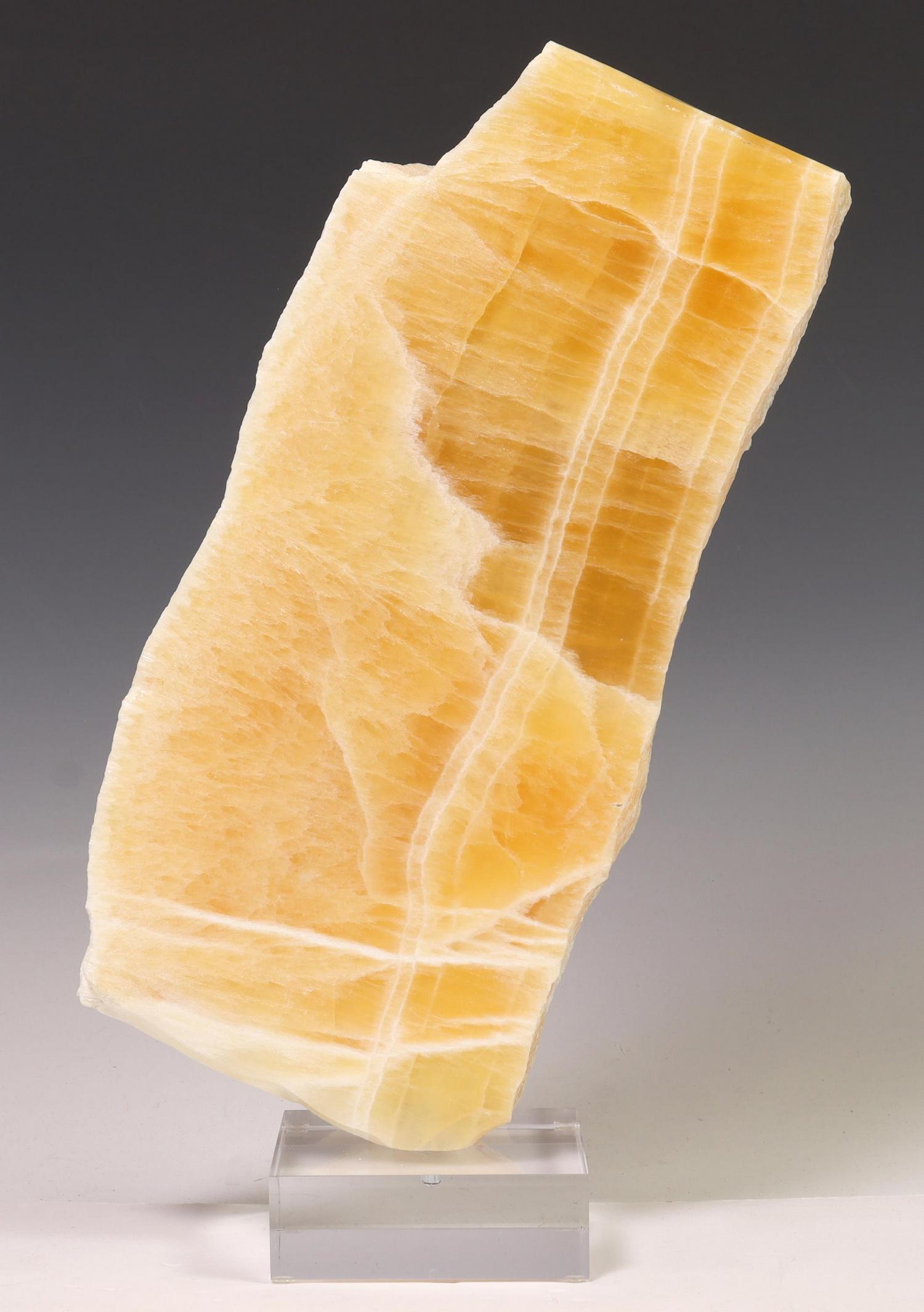 HONEYCOMB CALCITE SPECIMEN ON ACRYLIC BASE (1 of 3)