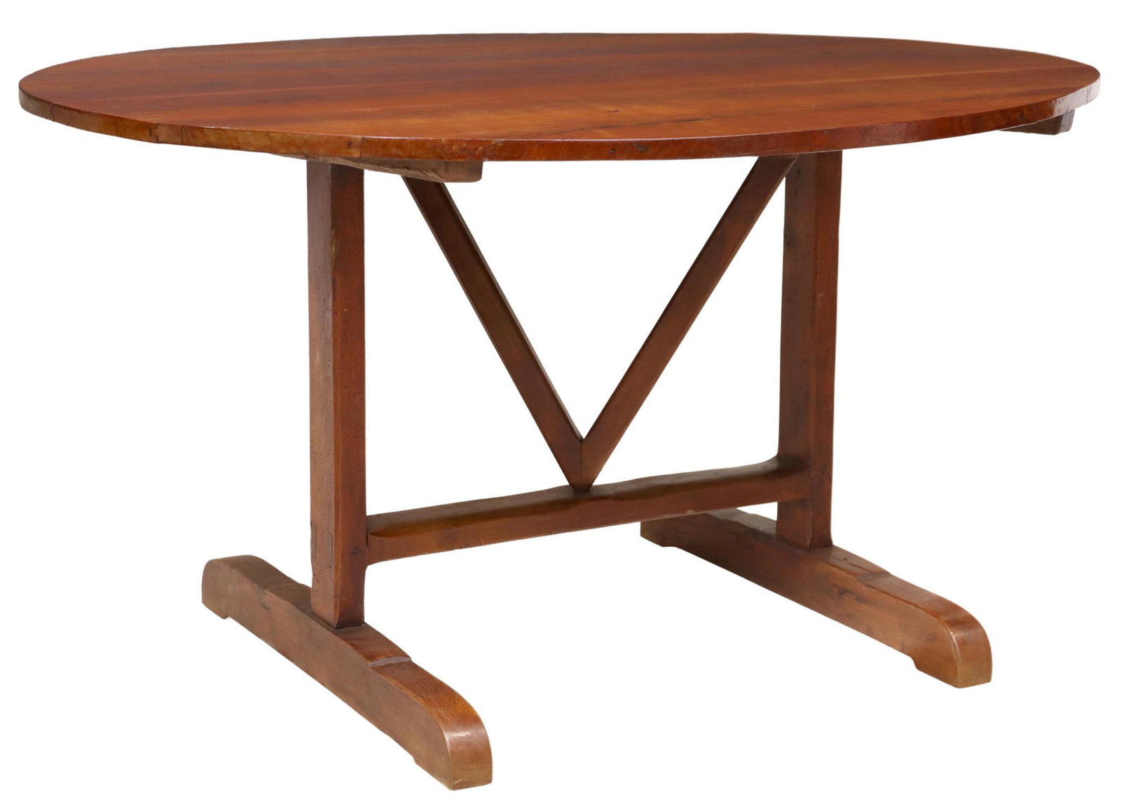 FRENCH PROVINCIAL TILT-TOP WINE TASTING TABLE: French Provincial fruitwood tilt-top wine tasting table, late 19th c., having ovular top, rising on trestle base, with swing support, open: approx 28"h, 52.5"w, 40.5"d Start Price: $350.00