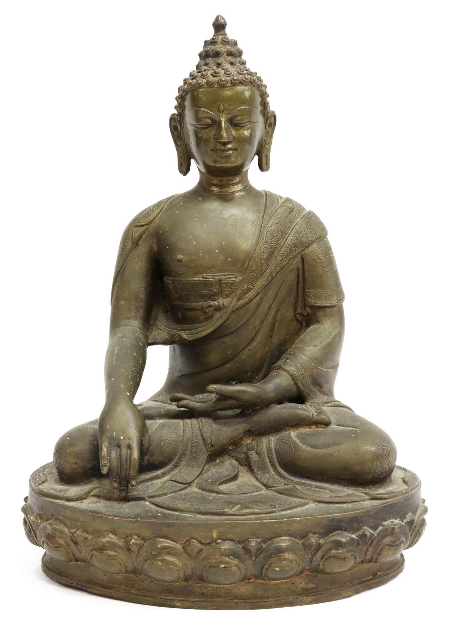 CHINESE PATINATED BRONZE SEATED BUDDHA: Chinese patinated bronze figure of the Buddha, the tightly curled hair with domed ushnisha, elongated earlobes, downcast eyes, draped robes patterned with four blessings symbol, seated in Bhumisparsha