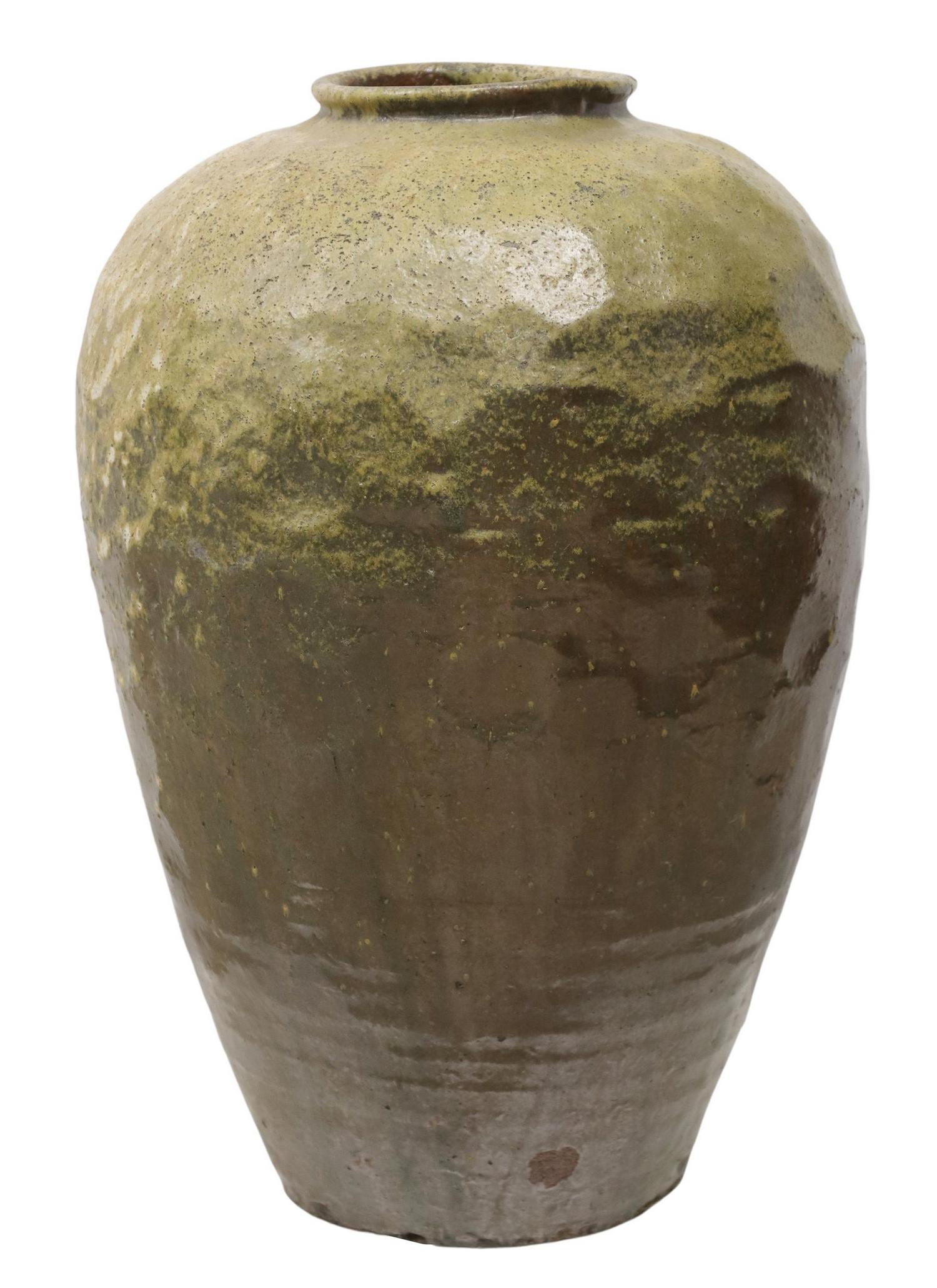 LARGE CHINESE GLAZED EARTHENWARE WINE JAR, 28"H: Large Chinese earthenware wine jar, having tapered body, in a partial brown glaze, approx 28"h, 17"diam Start Price: $100.00