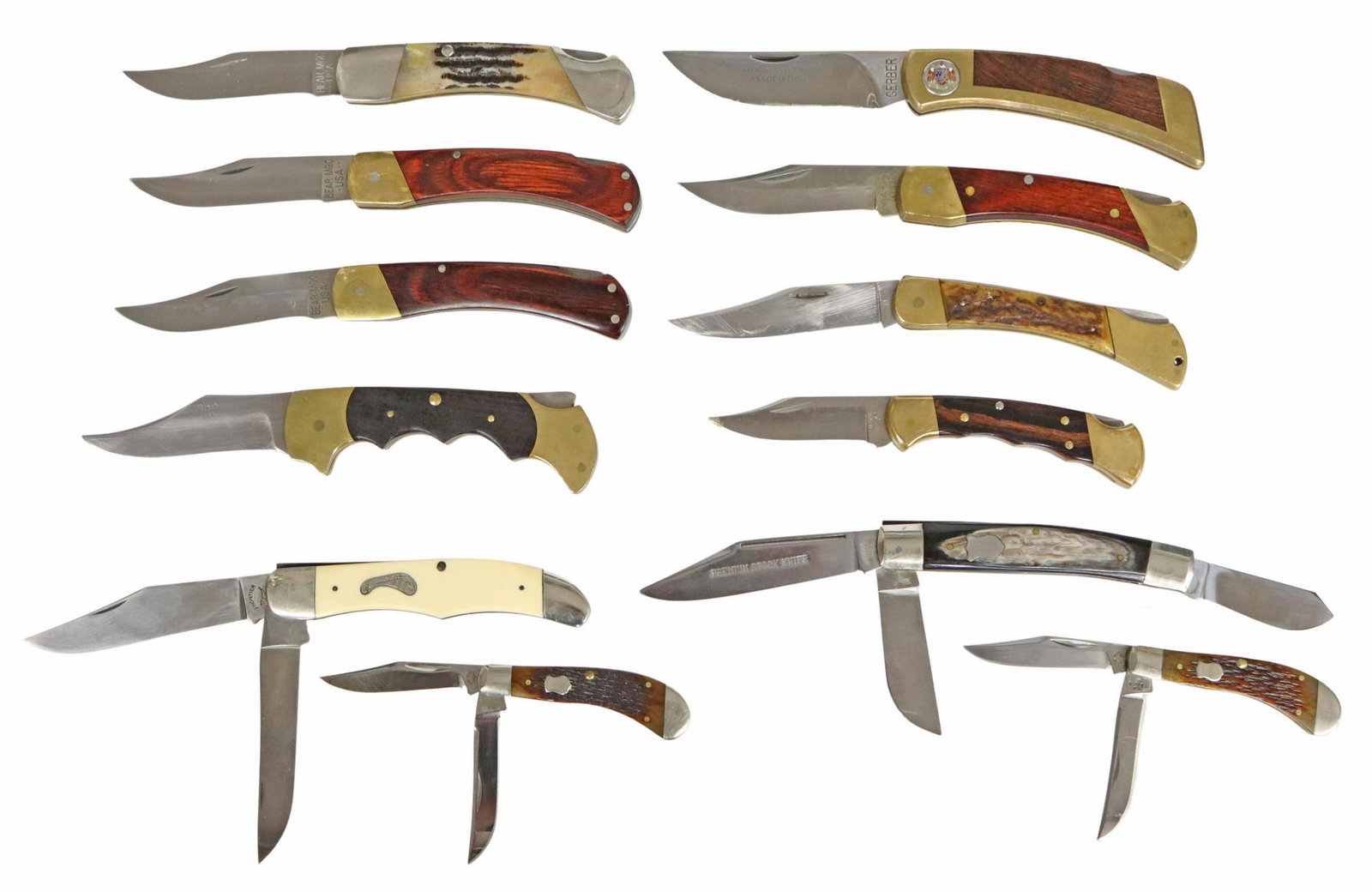 (12) POCKET KNIVES BUCK, GERBER, RIGID, MORE: (lot of 12) Pocket knives, unused and not sharpened, most well lubricated: (2) Bear MGC, 3.75" clip point blades, red wood handles; (1) Bear MGC, 3.75" clip point blade, jigged bone handle; (2) Case B