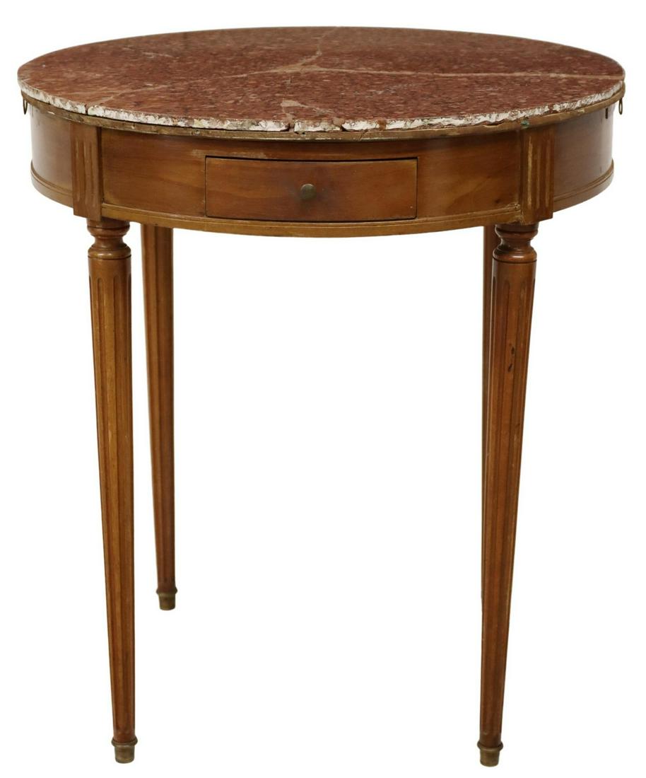 FRENCH LOUIS XVI STYLE BUILLOTTE TABLE, DAMAGED: French Louis XVI style mahogany bouillotte table, 20th c., round marble top, apron fitted with two drawers and two pull out slides, rising on fluted and tapered legs, marble top with complete visible 