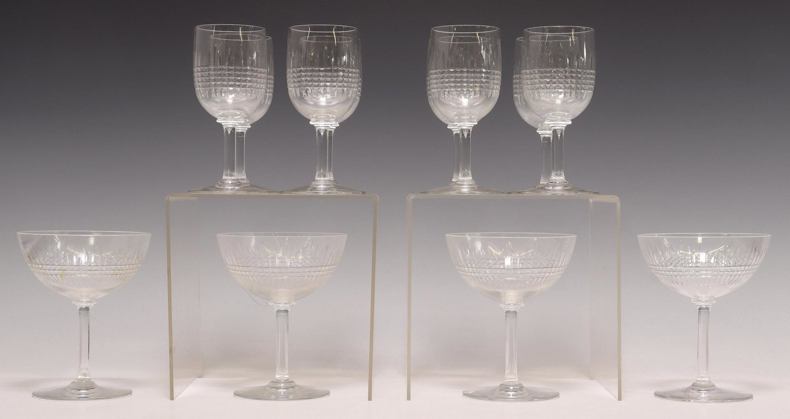(12) BACCARAT NANCY CRYSTAL CHAMPAGNE & PORT WINE: (lot of 12) French cut crystal stemware, Baccarat, in the "Nancy" pattern, acid-etched mark underfoot, including: (4) champagnes/ tall sherbets, approx 4 7/8"h, 3 7/8"diam, (8) port wine glasses, appr