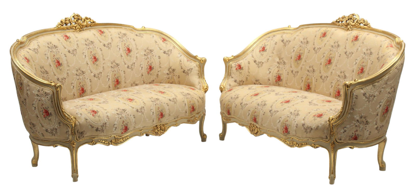 (2) LOUIS XV STYLE PARCEL GILT UPHOLSTERED SETTEES: (pair) Louis XV style parcel gilt and painted canape settees, in a floral upholstery, approx 39"h, 61"w, 32"d, seat height: approx 17.5"h Start Price: $800.00