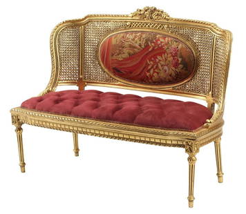 LOUIS XVI STYLE GILT CANED UPHOLSTERED SETTEE: Louis XVI style gilt caned settee, button-tufted upholstered seat, rising on tapered fluted legs, approx 38"h, 49"w, 23"d, seat height: 17.75"h Start Price: $300.00