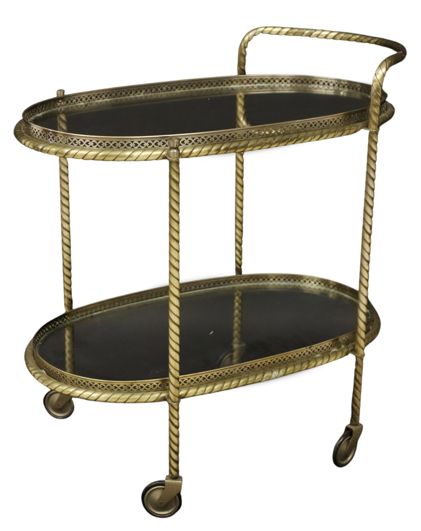 ITALIAN GILT METAL & GLASS 2-TIER SERVICE TROLLEY: Italian gilt metal bar cart/ service trolley, 20th c., having two colorless glass tiers with pierced metal gallery, rising on castors, approx 30.5"h, 29"w, 18"d Start Price: $200.00