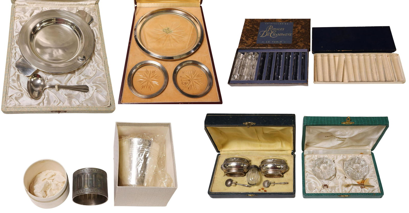 (LOT) ASSORTED FRENCH SILVERPLATE TABLE ARTICLES: (lot) French silverplate and glass table articles, assorted makers and patterns, highlights include: (3 pieces) Orfevrerie St. Medard trivet and bottle coasters, (1) napkin ring, (1) beaker, (22) glas
