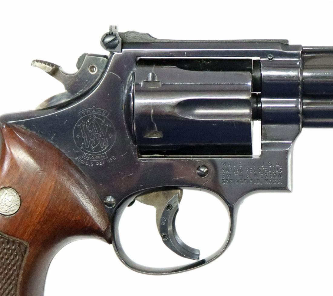 SMITH & WESSON M53 REVOLVER, .22MAG, 8.3/8" BARREL: Smith & Wesson Model 53 double action revolver, ,22 Magnum caliber, 8.25" barrel, adjustable rear sight, six round swing out cylinder, checkered wood logo grips, finish with light scratching, cylinder