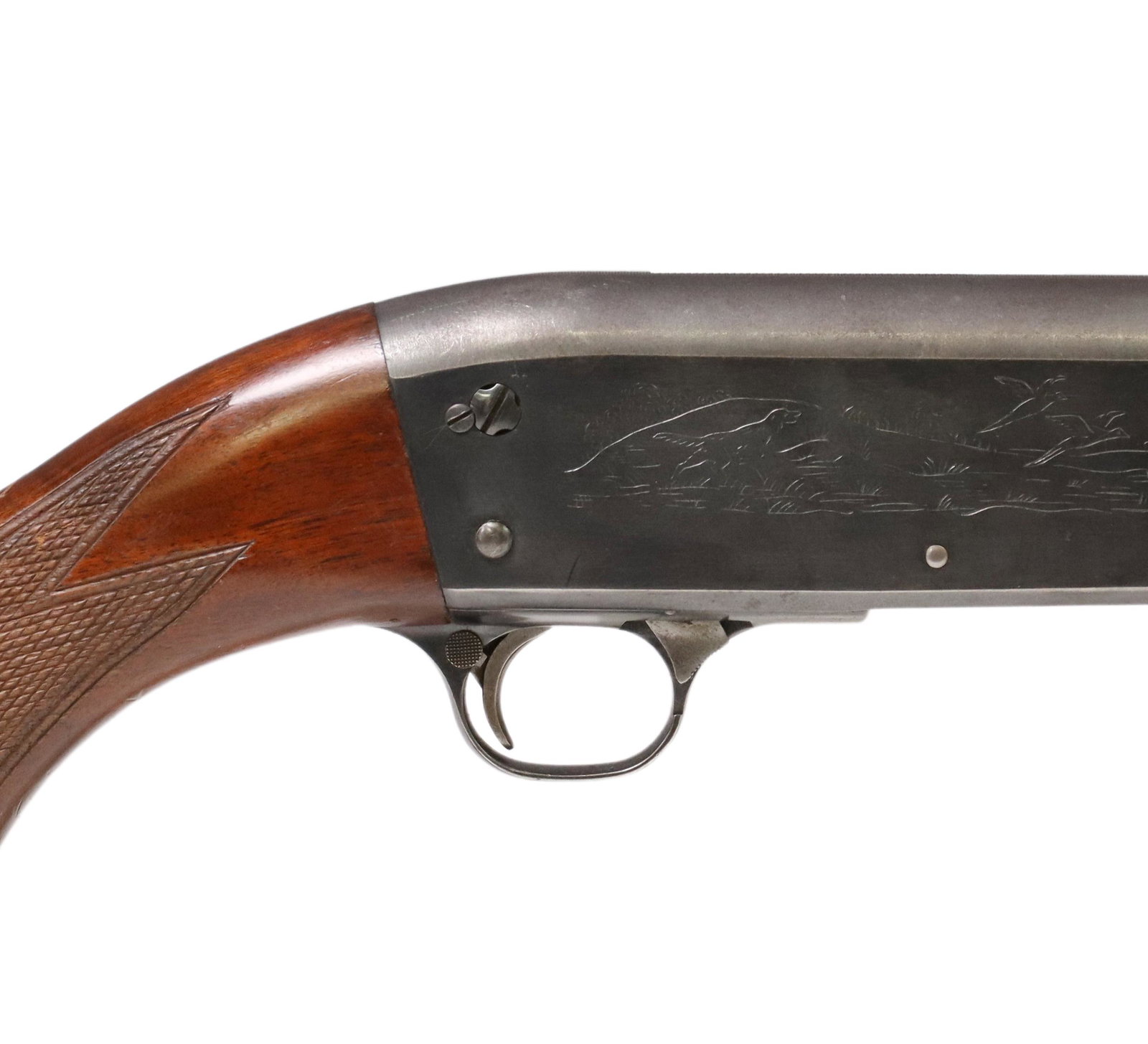 ITHACA 12 GAUGE PUMP SHOTGUN: Ithaca slide action shotgun, 12 gauge, 2.75" chamber, 28" barrel including the installed Poly Choke, light game birds and dog engraving at receivers, hardwood stock, action good, wood with light scrat