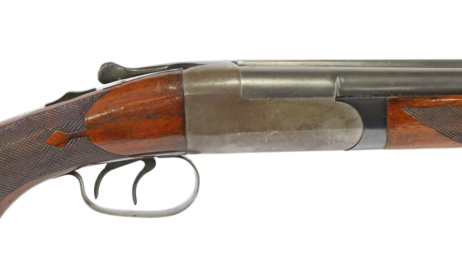 WINCHESTER MODEL 24 SIDE BY SIDE 12 GA SHOTGUN: Winchester Model 24 side by side shotgun, mfg. 1939, 12 gauge, 30" barrels, 2.75" chambers, bead front sight, slide safety, double triggers, checkered stock, recoil pad, barrels with light scratching,