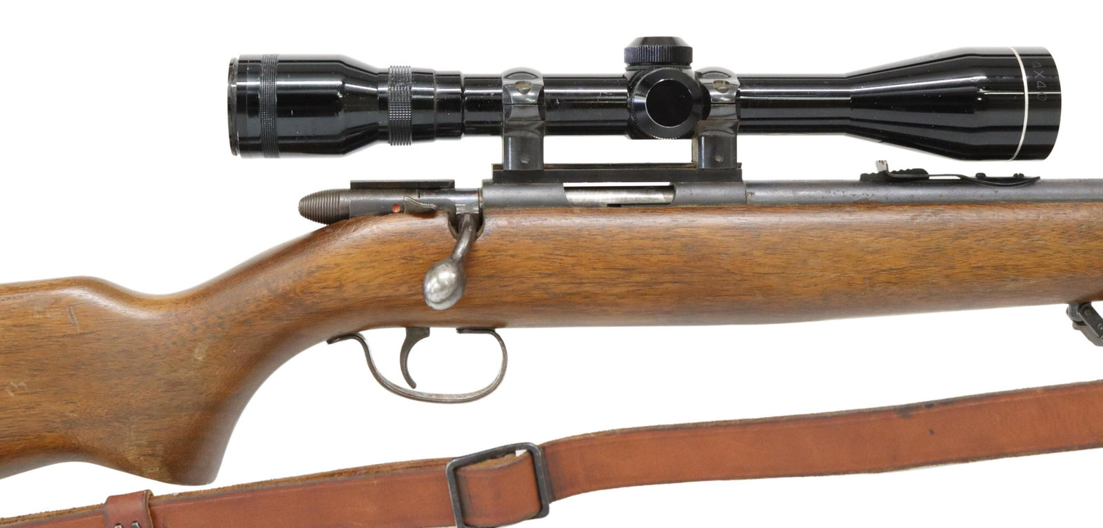 REMINGTON 510 RIFLE, .22 CALIBER, TASCO SCOPE: Remington Model 510 rifle, bolt action, .22 caliber, 24" barrel, blade front sight, adjustable rear sight, mounted Tasco 4X40 scope, hardwood stock, two sling posts, leather sling, bore bright with go