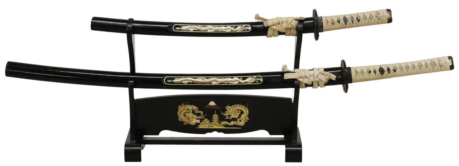 (3) JAPANESE SWORDS, KATANAS & STAND, 20TH C.: (lot of 3) Japanese ceremonial swords, katanas, late 20th c., each with rope wrapped handle over likely ray skin and housed in black lacquered scabbard, one with 30" blade, one with 19" blade, there a