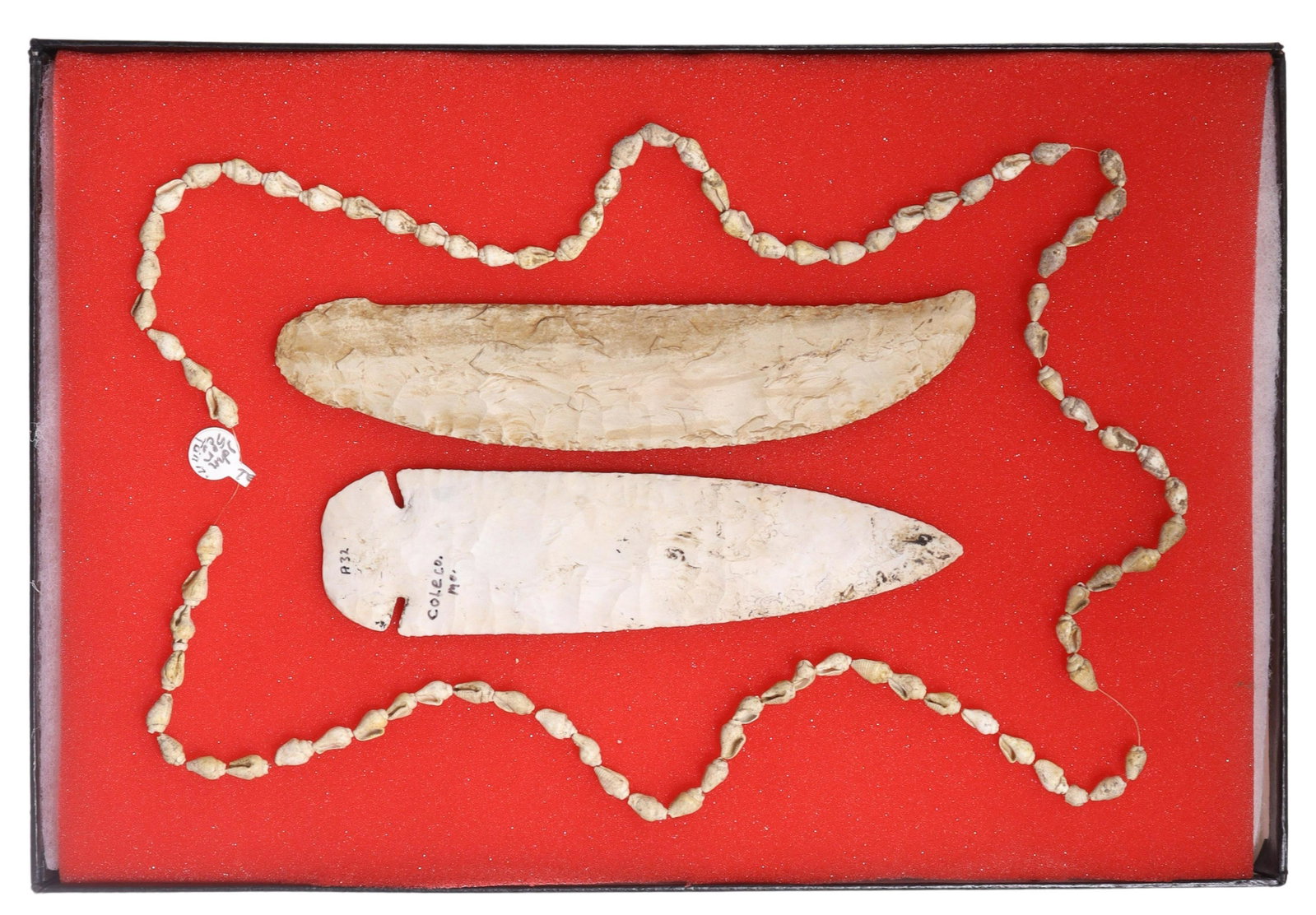 (3) NATIVE AMERICAN SPEAR HEAD, NECKLACE, SCRAPER: (lot of 3) Native American items: (1) Conch shell necklace on later monofilament, approx. 32"l, most shells .25"l-3/8"l; (1) spear head marked "Cole Co., Mo." (Central Missouri), approx. 6.25"l, 1.5/8