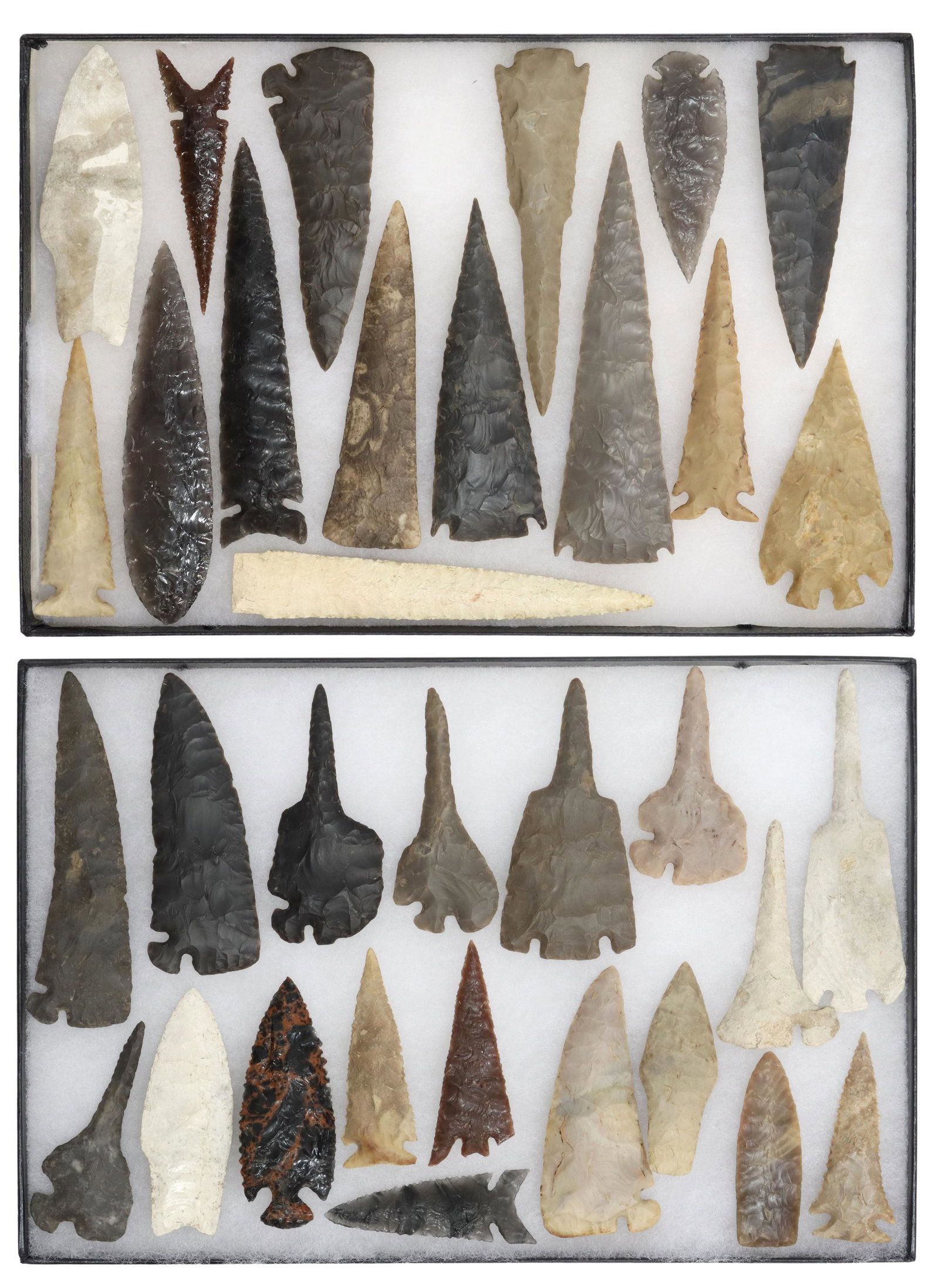 (35) MODERN ARROWHEADS, SPEAR POINTS, CORNER TANGS: (lot of 35) Modern arrowheads, projectile heads and more, largest: approx 5.5"l, 1.25"w, housed in two 12.25" x 8.25" Riker boxes; 3.75lbs total Start Price: $80.00