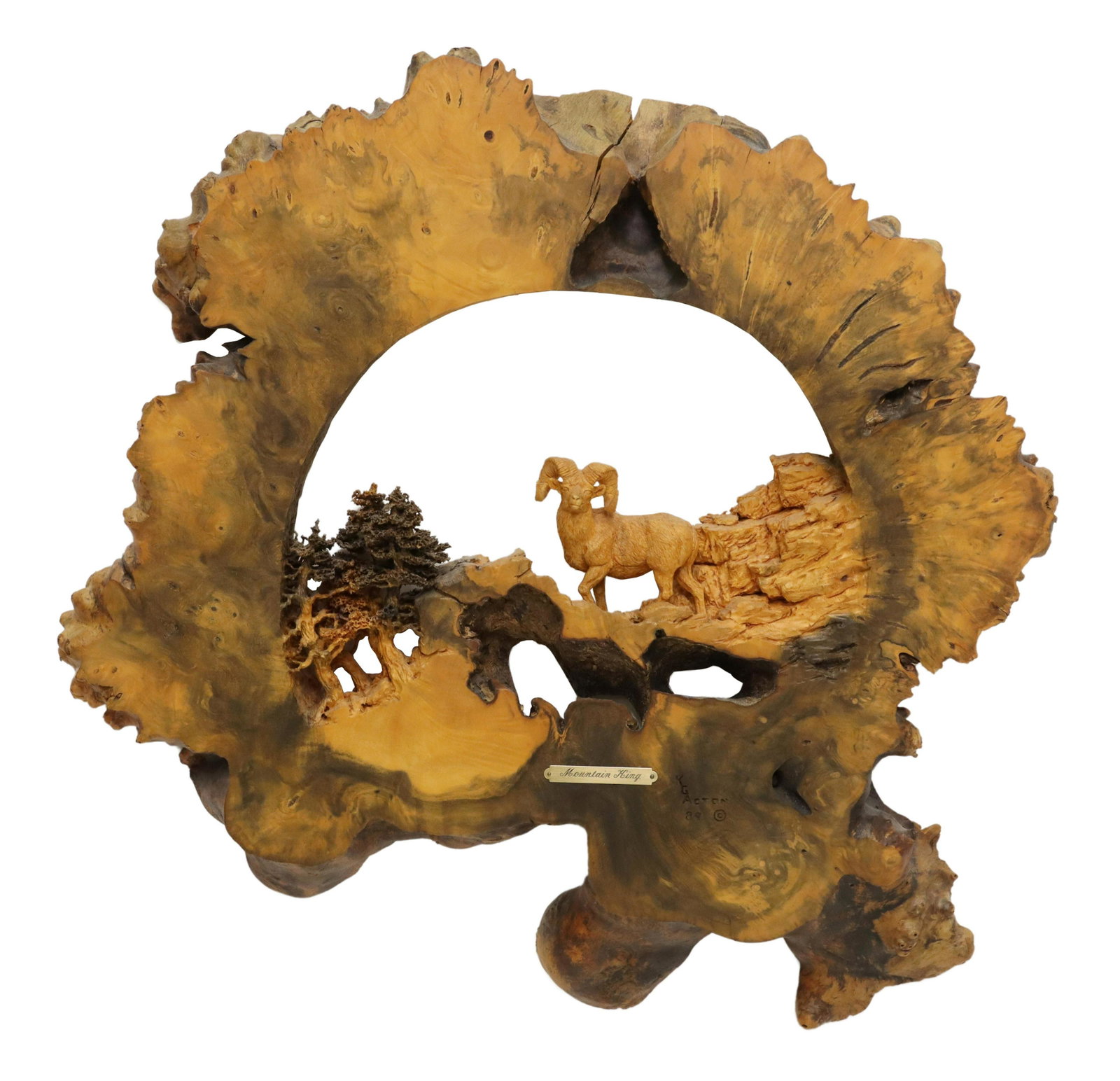 KEN ACTON (20TH C.) WOOD SCULPTURE 'MOUNTAIN KING': Carved buckeye burlwood relief sculpture, "Mountain King," signed lower right K.G. Acton (Ken G. Acton, American, 20th c.), dated 1989, titled recto, numbered K844A verso, in a Defthane varnish finish