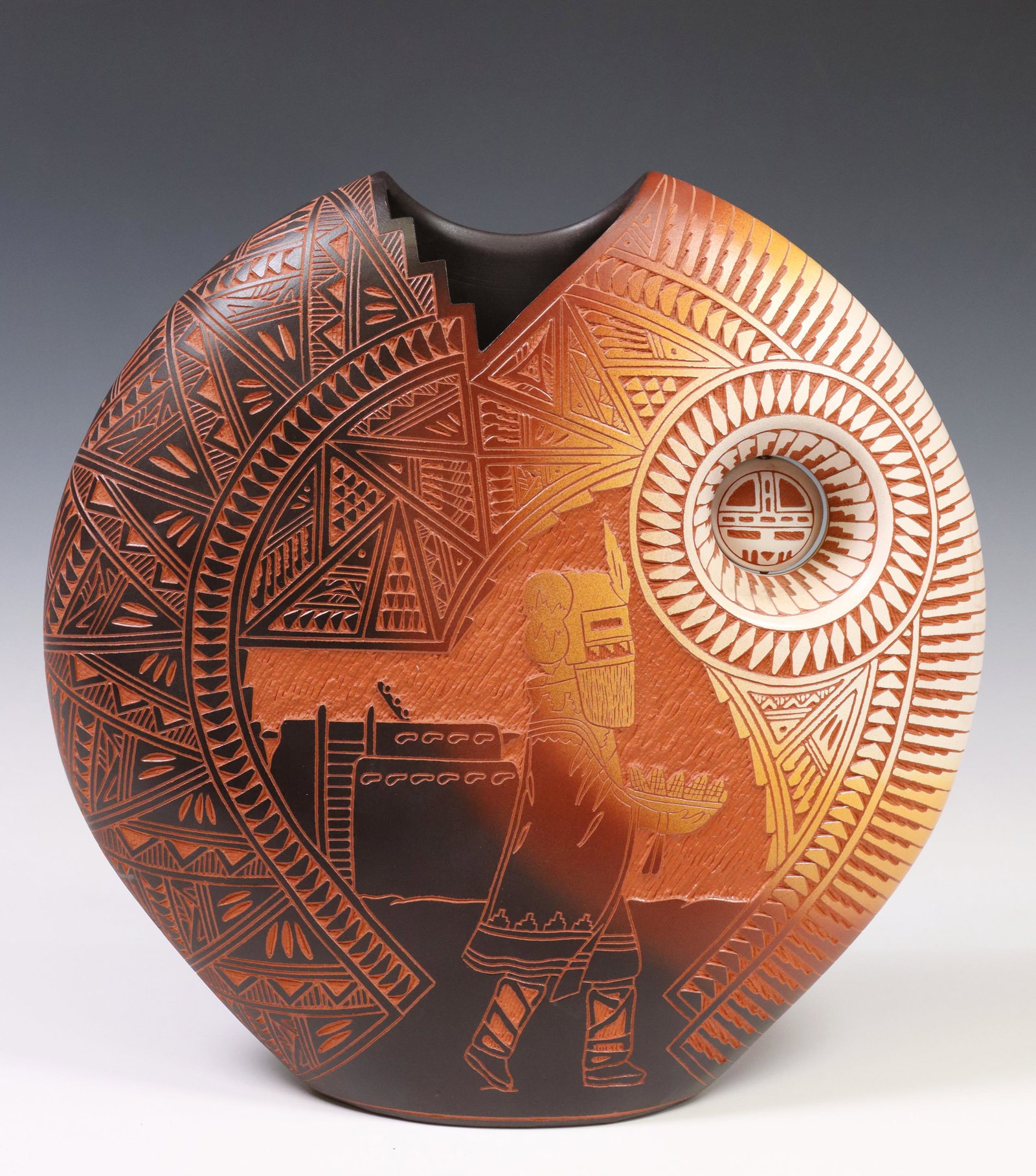 DIANE & JR ARAGON NEW MEXICO PUEBLO POTTERY VESSEL: Native American pottery vessel, Diane Aragon (Laguna Pueblo, b.1965) and Wilbert "Junior" Aragon (Acoma Pueblo, b.1966), New Mexico, dated 1999 , incised geometric design, with Kachina figure, with su