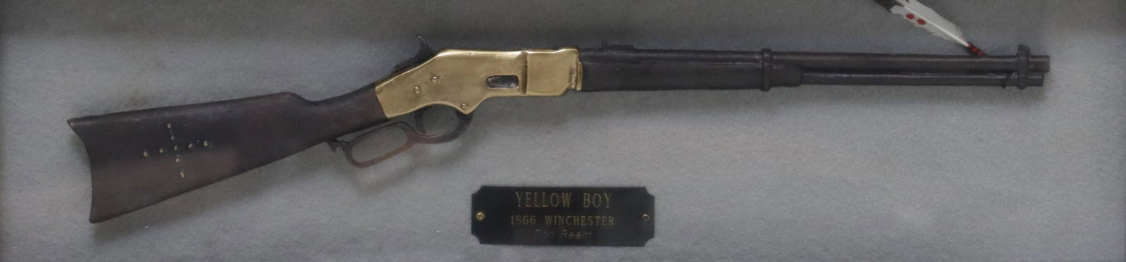 DON REAM (20TH C) BRONZE SCULPTURE 1866 WINCHESTER: Framed patinated and polished bronze sculpture, "Yellow Boy - 1866 Winchester," Don Ream (American, 20th c.), overall: approx 8"h, 22"w, 4lbs **Provenance: From a fine Houston, Texas estate** Start Pr