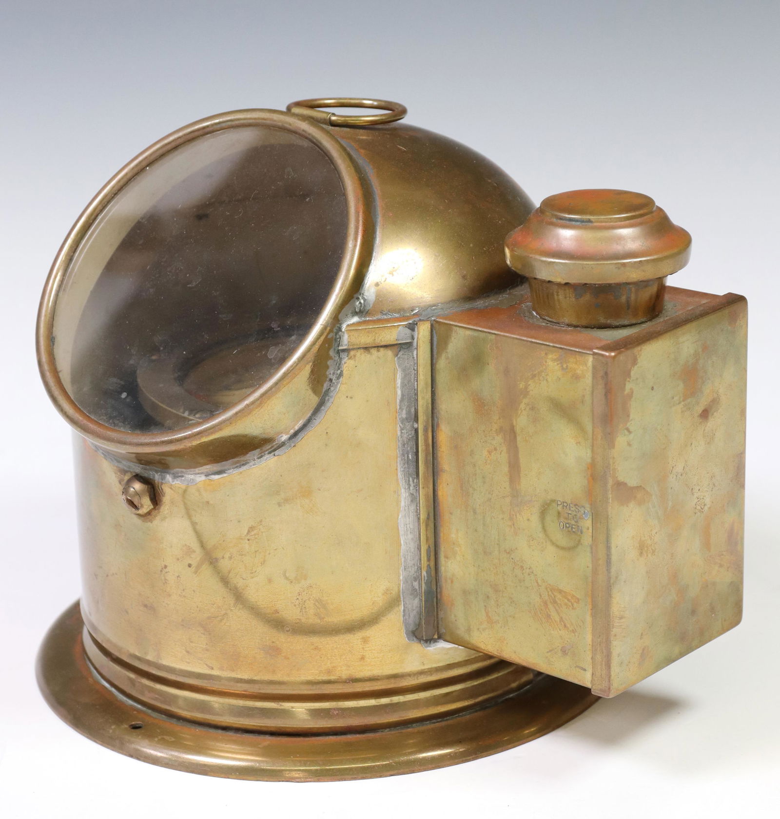 ENGLISH SESTREL BRASS BINNACLE COMPASS & OIL LAMP: English antique ships brass binnacle compass, top dome with glass viewing panel, gimbaled Sestrel compass, flanked by cased oil lamp, approx 8.75"h, 10"w, 8.25"d, 7.25lbs Start Price: $80.00