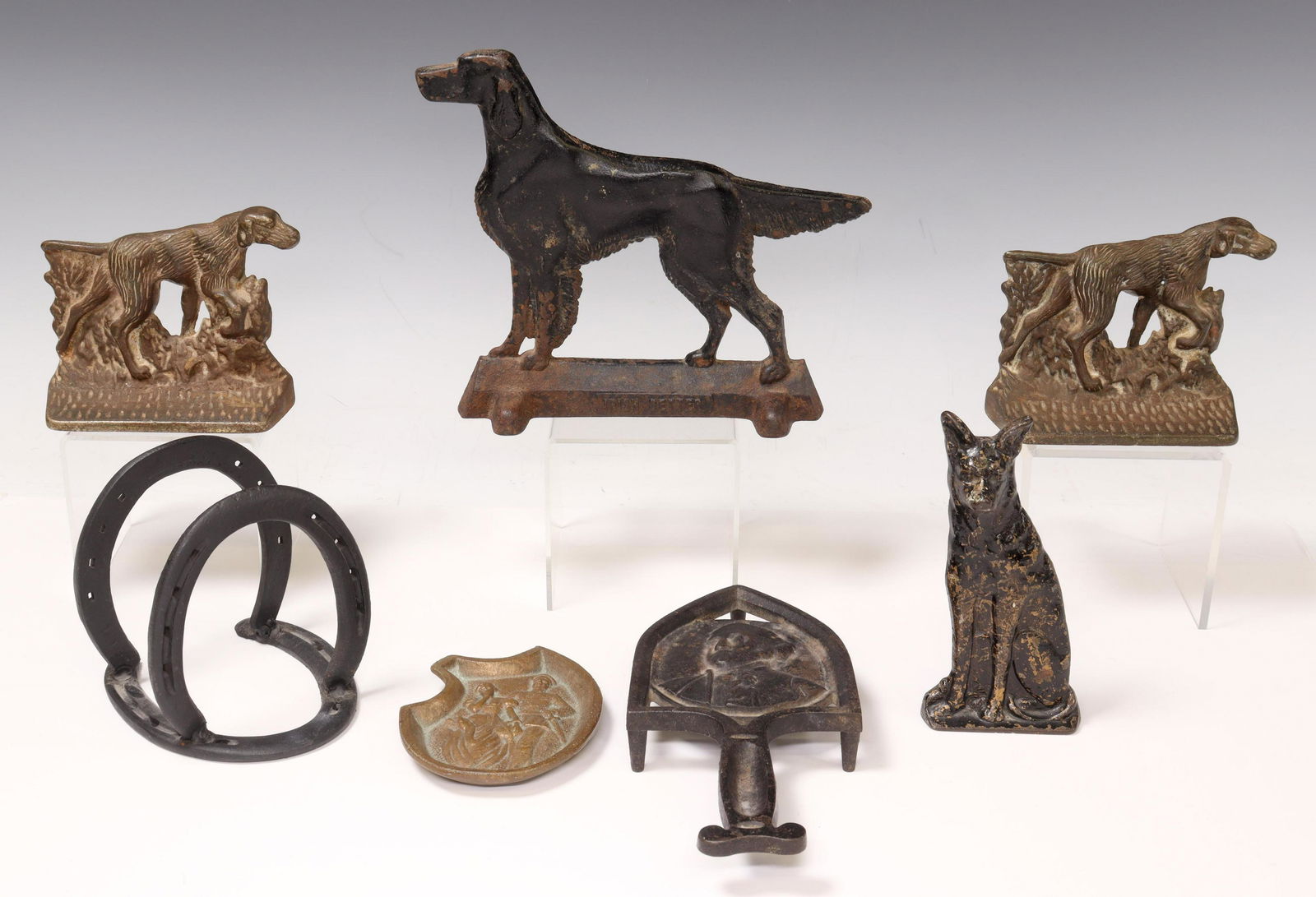 (7) AMERICAN PATINATED METAL HOME DECOR ITEMS: (lot of 7) American patinated metal home decor items, including: (1) cast iron trivet, having central portrait of George Washington, inscribed Mackinaw City, Michigan underfoot, approx 9.5"l, 4.5"d; (