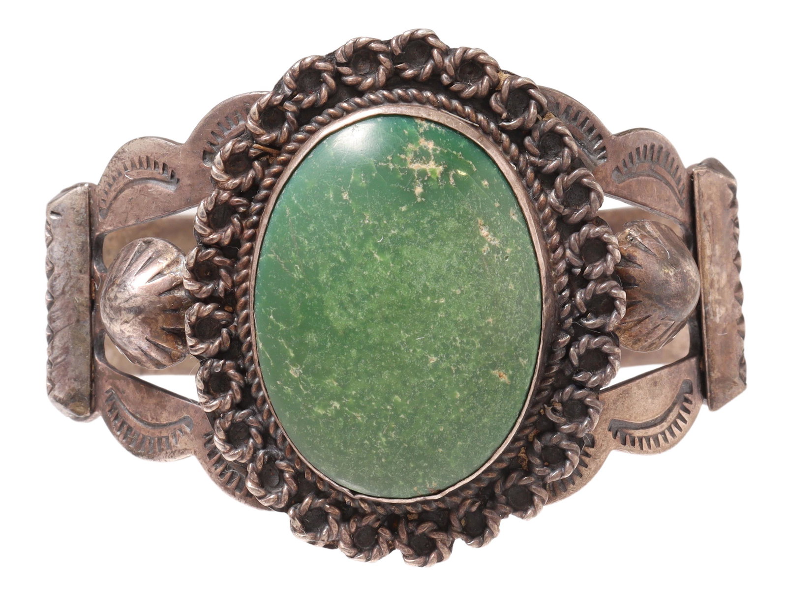 SOUTHWEST STERLING SILVER STAMPWORK CUFF: Southwest sterling silver cuff bracelet, bezel-set green stone cabochon, twisted wire rope borders, shoulders with stamped designs, approx 1.75"w, interior: 5.75"l, gap: approx 7/8"w, 48.2 grams (incl