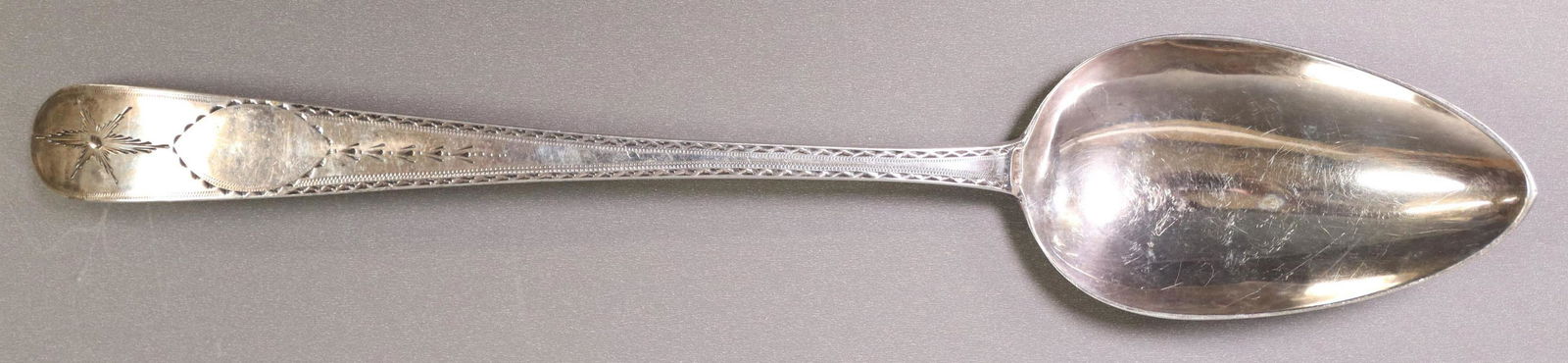 IRISH GEORGE III BRIGHT CUT STERLING SERVING SPOON (1 of 4)