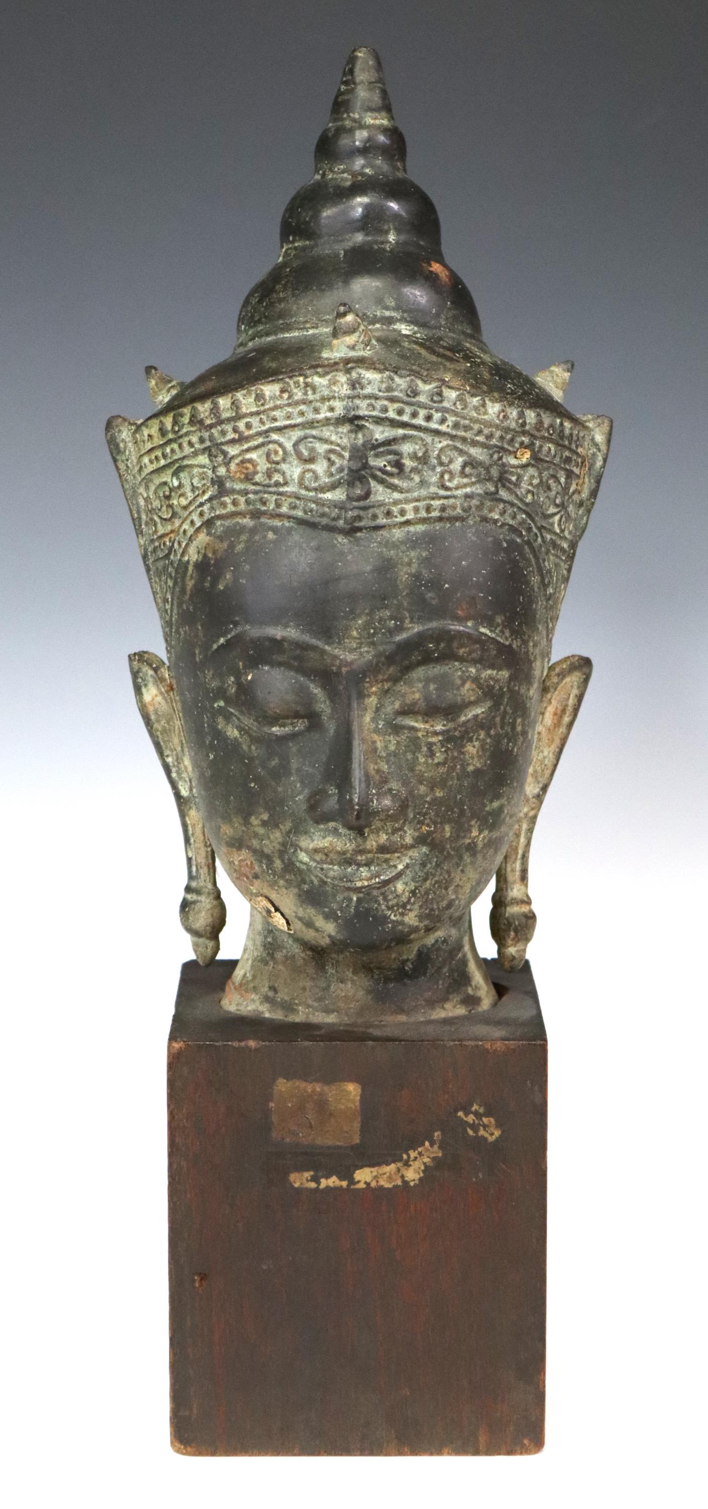 ASIAN BRONZE BUDDHA HEAD ON WOOD BASE (1 of 3)