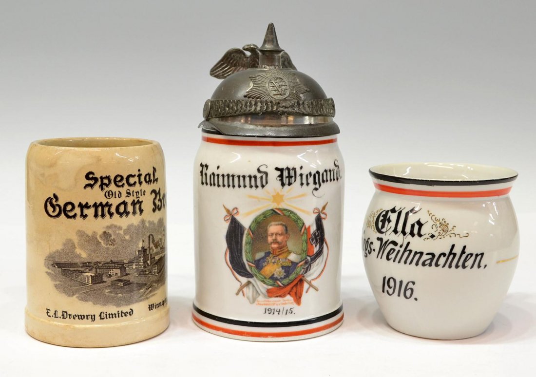 (3) ANTIQUE GERMAN VESSELS, PICKELHAUBE LITHOPHANE: (lot of 3) Antique German drinking vessels: (1) German lithophane stein, the pewter lid in the form of a pickelhaube with Saxon helmet plate, the white ceramic body personalized 'Raimund Wiegand' abov