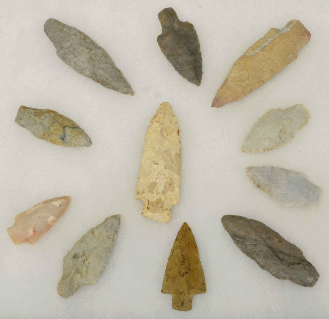 (11) PREHISTORIC ADENA INDIAN ARROWHEADS: (lot of 11) Adena Indian arrowheads,flintridge flint, Ohio, ex. David Rowland, largest: 3.7/8"l, 2.5"l, box: 1"h, 16.25"w, 12.25"d Start Price: $100.00