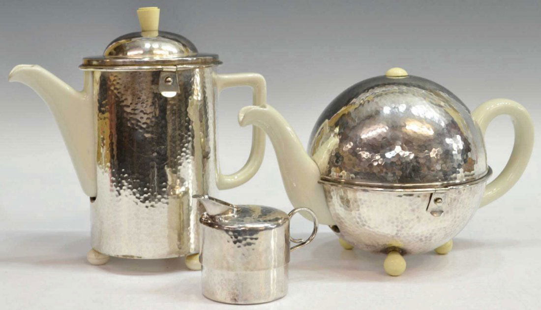 (3) ART DECO MODERNIST WMF & HUTSCHENRUETHER SET: (lot of 3) Art Deco Modernist silver plate coffee and tea service, WMF (Württembergische Metallwarenfabrik AG), hand hammered silverplate WMF ) fittings on each porcelain kettle marked Hutschenreuthe