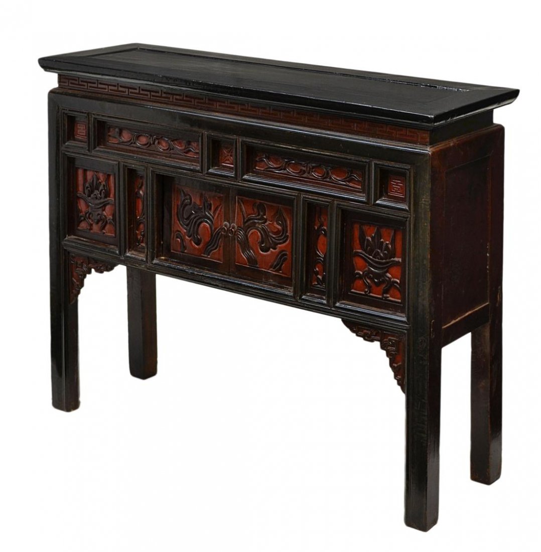 ASIAN BLACK & RED LACQUERED TABLE / CABINET: Asian lacquered cabinet in black with red accents, 20th c., rectangular top above two sliding doors, all rising on square block legs, 32'h, 39.75"w, 13"d, (8C056) Start Price: $100.00