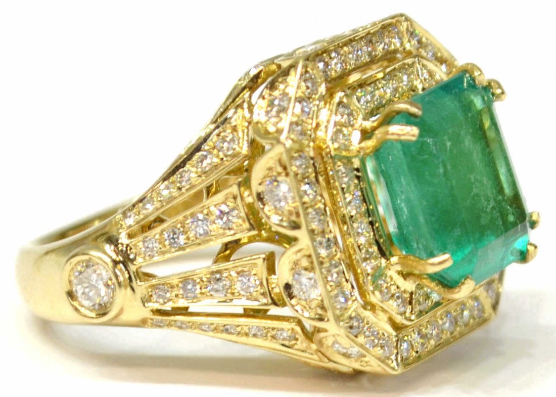 LADIES 14KT YELLOW GOLD DIAMOND AND EMERALD RING: Ladies yellow gold cast emerald and diamond ring, containing: (1) prong set rectangular standard step cut natural emerald, 10.20 x 9.34 x 6.50mm, approx. 4.43ct., clarity: heavily included, type III,