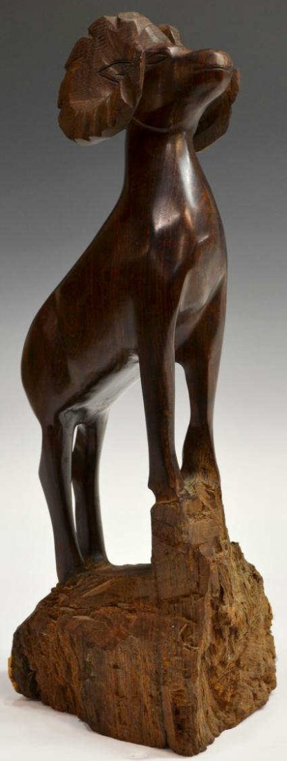 LARGE EXOCTIC WOOD CARVED RAM SCULPTURE: Exotic wood sculpture carved in the form of a ram with head held high, perched upon a rocky base, the body being polished and base remaining natural,17.5"h, 6.5lbs Start Price: $80.00