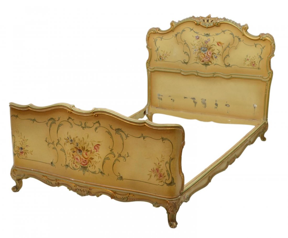 VENETIAN LOUIS XV STYLE PARCEL GILT PAINTED BED: Venetian Louis XV style parcel gilt painted bed, 19th c., scrolled borders with pierced rocaille crest on the headboard, polychrome floral decoration on a cream ground with gilded borders, some losses