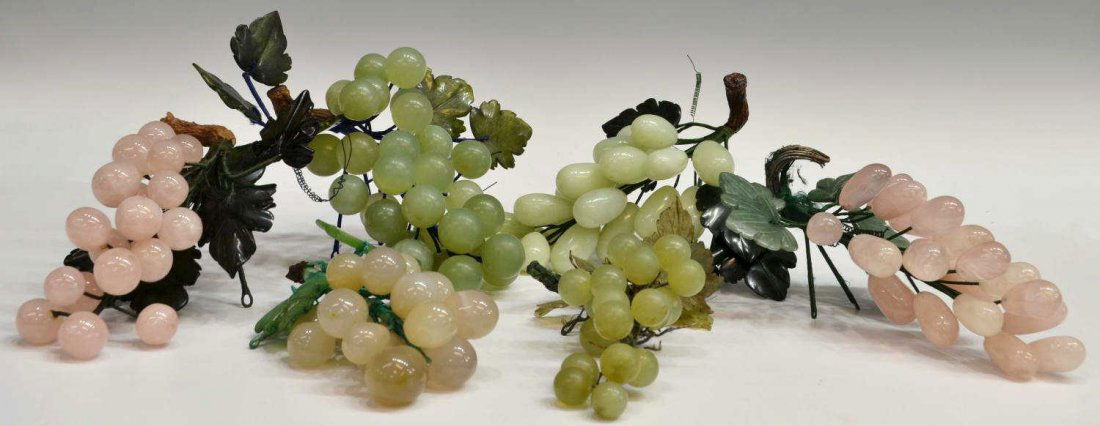 (6) COLLECTION OF JADE, ROSE QUARTZ GRAPE BUNCHES: (lot of 6) Collection of Chinese hardstone grape bunches of rose quartz, jade, etc. in rich greens, celadon and light peach, with some loose grapes, overall some loss and chipping, largest: 9"l, 6lbs