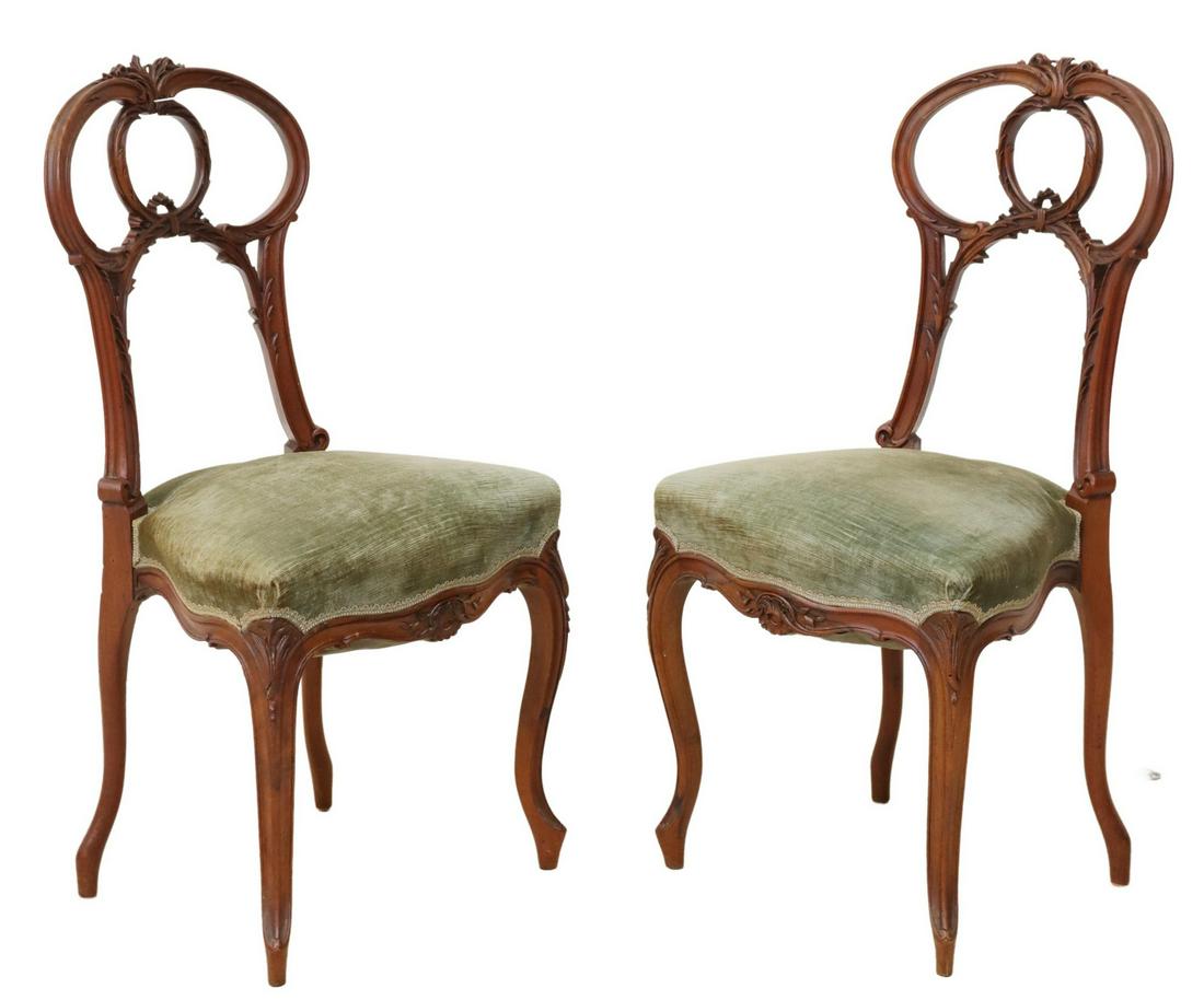 (2) FRENCH LOUIS XV STYLE MAHOGANY HALL CHAIRS: (pair) French Louis XV style carved mahogany side chairs, late 19th c., having shaped back with carved foliate motifs, padded seat in green fabric upholstery, ribbon trim, rising on cabriole legs, app