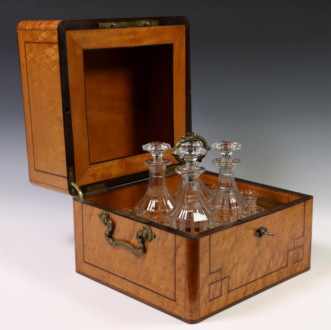FRENCH NAPOLEON III PERIOD BIRDSEYE CAVE A LIQUEUR: French Napoleon III period cave a liqueur, 19th c., birdseye case with contrasting inlaid stringwork and central "Liqueurs" inscription, dual side handles, opening to removable cradle fitted with (fou